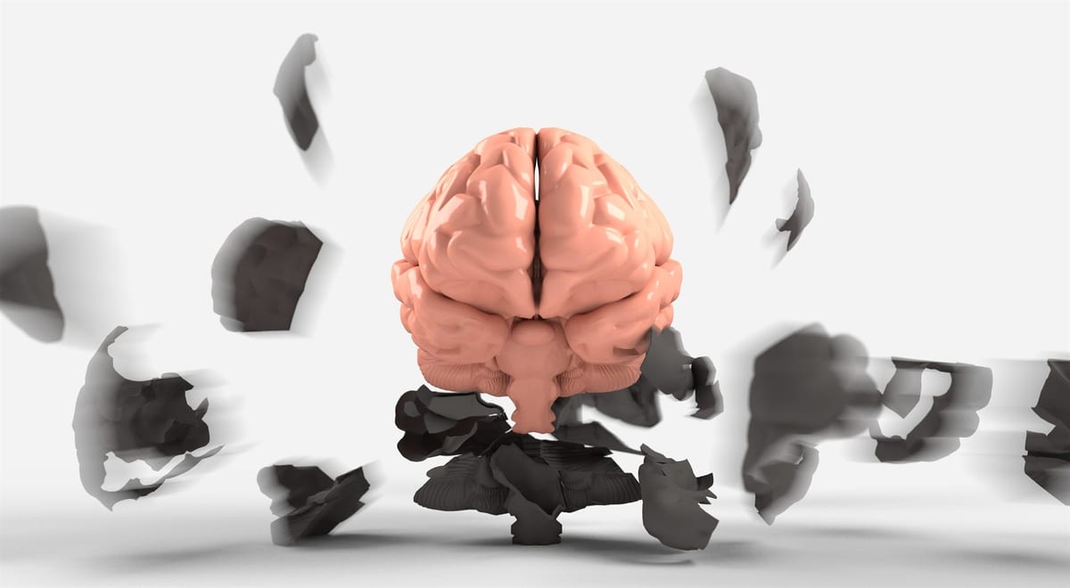 Conceptual illustration of a brain surrounded by scattered dark fragments