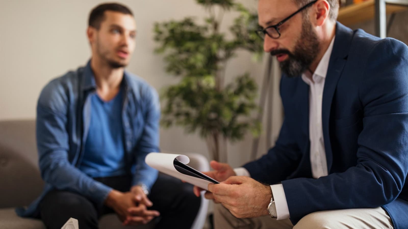 Patient talking with a therapist during a cognitive behavioral therapy session