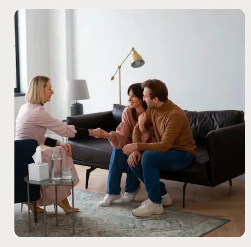 Couple meeting with a counselor during family therapy